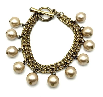 Brazalete colgante Avon Champagne perlas tono dorado cadena estrás cierre de palanca 8,5 Foto 1 de 4