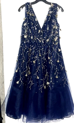 Vestido de cóctel Oscar de la Renta otoño 2017 borla dorada borlada azul tul 8 Foto 1 de 3