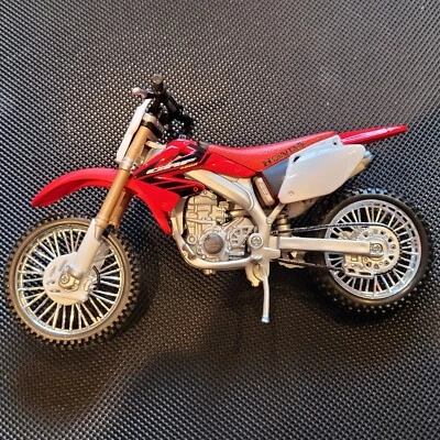 Moto Honda CFR 450R fundido a presión escala 1/12, rojo y dorado Foto 1 de 2