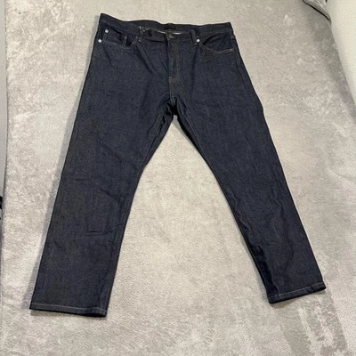 Pantalones de mezclilla elásticos Uniqlo para hombre 38x28 índigo oscuro ajustados ribete recto Kaihara Foto 1 de 4