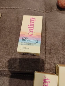 TINTE DIFUSOR CALIRAY SKIN WELLNESS 10 A HAPPY MEDIUM DREAM 1.0 FL. OZ. - Imagen 1 de 2