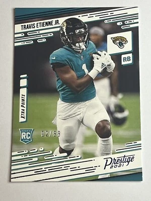 2021 NFL Chronicles Travis Etienne Jr. Prestige BLUE RC #'d 02/99 - Image 1 of 2