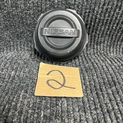 Nissan NV200 2013-2020 furgoneta 40343-3LM0A negro genuino OEM tapacubos tapacubos Foto 1 de 4