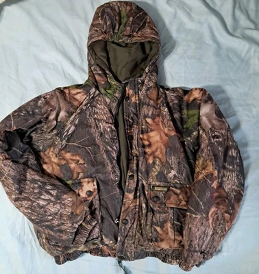 Chaqueta acolchada reversible Remington para jóvenes niños, verde militar/camuflaje RealTree, talla Foto 1 de 4