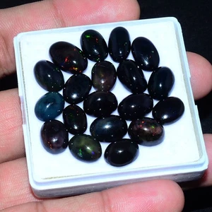 19 Pcs Natural Ethiopian Black Opal 10mm-13mm Oval Cabochon Flashy Gemstones Lot - Picture 1 of 14