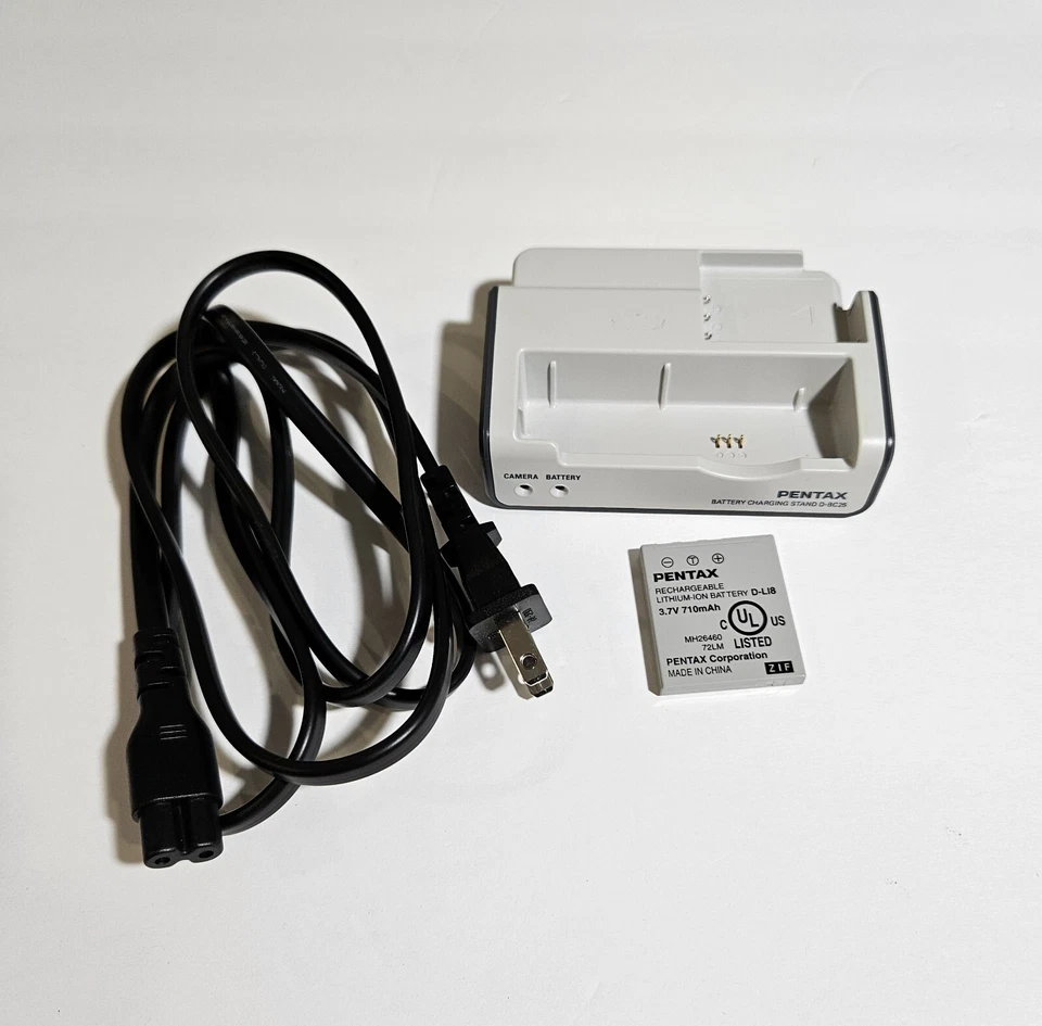 Soporte de carga de batería Pentax D-BC25 para cable Optio S5i y batería incluidos USADO Foto 1 de 4