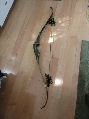 Arco recurvo vintage 1973-75 Bear Archery Kodiak Magnum RH45# 52" Foto 1 de 4