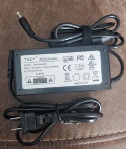 TKDY AC/DC Adapter Model TP06-090600W  - Bild 1 von 1