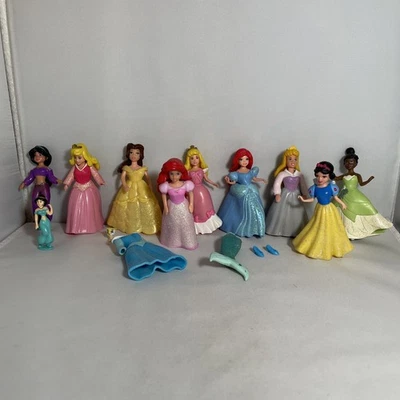 9 mini muñecas princesas Disney con ropa de goma Foto 1 de 4