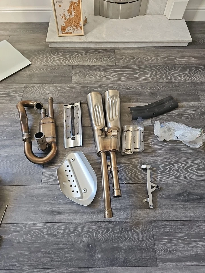 GENUINE TRIUMPH SCRAMBLER 1200 XE XC - EXHAUST MUFFLER - "T2205019" - NEW. - Image 1 of 1