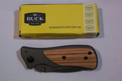 NAVAJA BUCK NAVAJA DE BOLSILLO CARPETA DE NOGAL CON CLIP DE CINTURÓN DE BLOQUEO DE HOJA NUEVA 6" EN GENERAL Foto 1 de 3