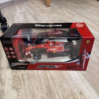 SF15-T Ferrari 1:24. von Formula Sebastian  Vettel NEU OVP - Bild 1 von 4