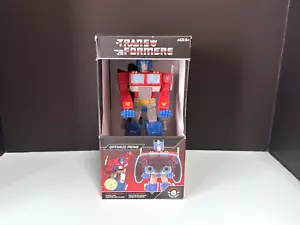 Transformers Optimus Prime Das Original Kabel Jungs Handy & Controller Halter NEU - Bild 1 von 8