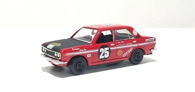 1/64 Konami Dydo NISSAN DATSUN BLUEBIRD 1600SSS RALLY modelo de coche fundido a presión Foto 1 de 3
