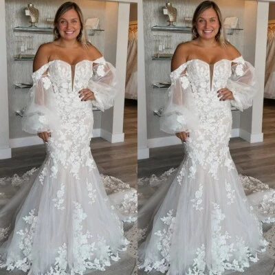 Vestidos de novia de sirena con hombros descubiertos mangas abullonadas vestidos de novia de tul de ensueño Foto 1 de 4