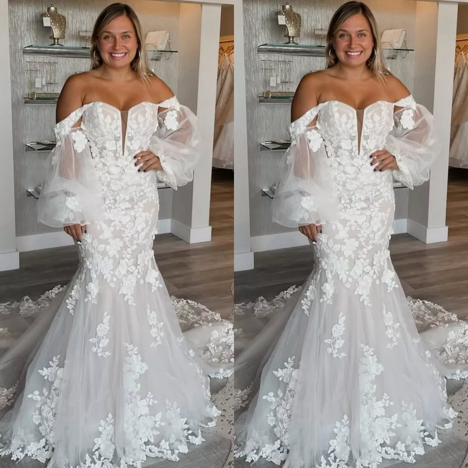 Vestidos de novia de sirena con hombros descubiertos mangas abullonadas vestidos de novia de tul de ensueño Foto 1 de 4