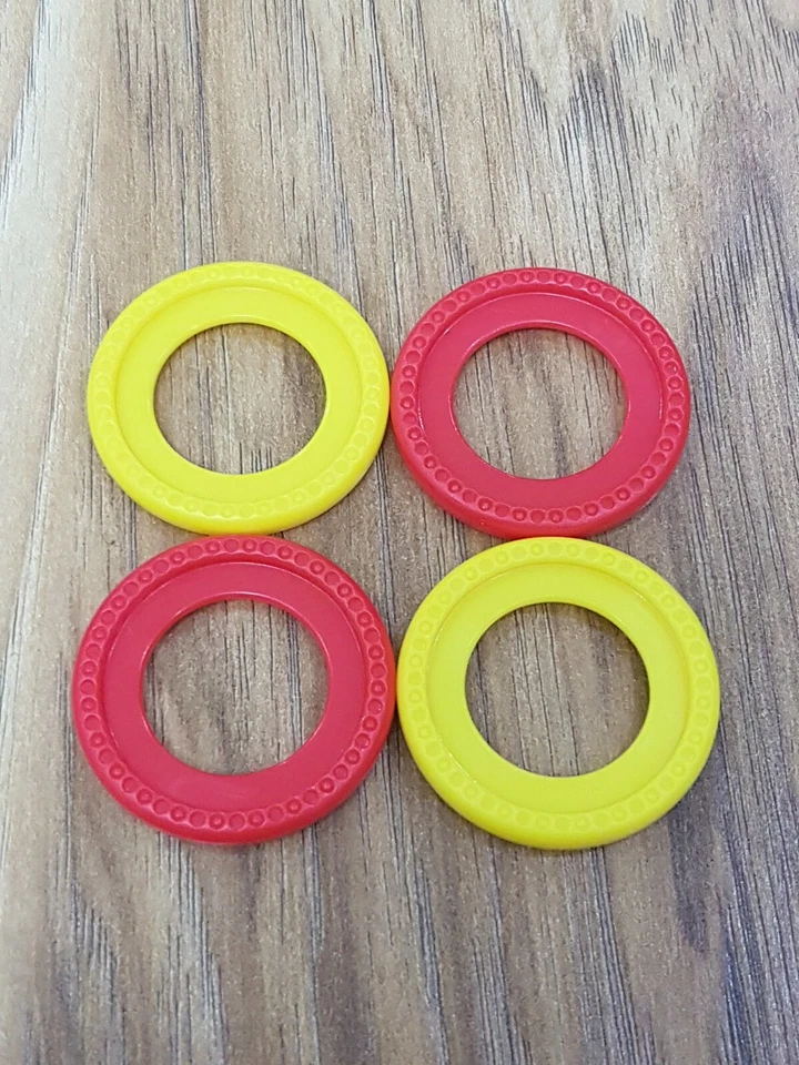 Hasbro Connect 4 Launchers Spare/Replacement 2 X Red, 2 X Yellow Counters/Rings - Image 1 of 1