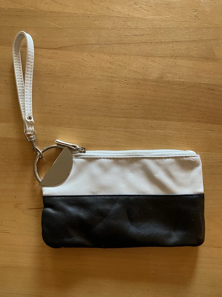 Cartera estilo clutch para mujer negra, blanca y cromada The Avenue de colección Foto 1 de 3