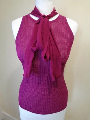 GUCCI JERSEY DE SEDA ROSA OSCURO SIN MANGAS CON DETALLE DE LAZO EN EL COÑO - TALLA XS - TEXTURA Foto 1 de 4