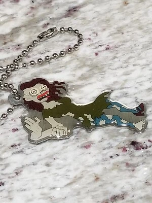 New Unactivated Geocoin - Tiffany the Zombie Cache Buddy - Image 1 of 2