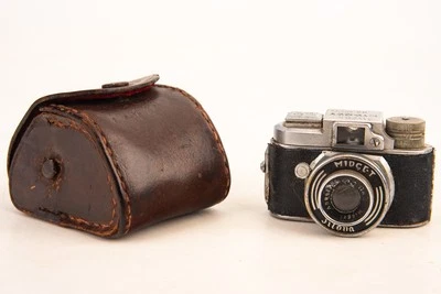Cámara estilo hit Jilona Midget modelo 2 en estuche 14 x 14 mm exposiciones película 17,5 mm V27 Foto 1 de 4
