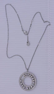 SWAROVSKI HALSKETTE MIT KREIS, SCHEIBENANHÄNGER & SCHWEBENDEN KRISTALLSTEINEN - Bild 1 von 5