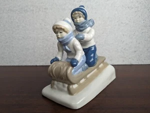 Porcelana De Cuernavaca Sledding Figurine Porcelain Two Children on Snow Sled - Picture 1 of 16