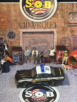 Coche de policía Hot Wheels Buick Regal 27 1:64 negro diecast usado casi nuevo estado Foto 1 de 4