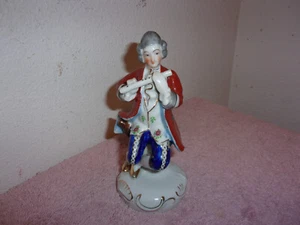 VINTAGE OCCUPIED JAPAN PORCELAIN MULTI-COLORED MUSICIAN PLAYING FLUTE FIGURINE - Picture 1 of 6