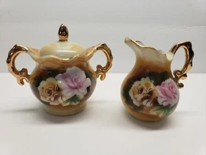 Enesco Miniature Creamer And Sugar With Lid. Tan With Floral Design  - Picture 1 of 4
