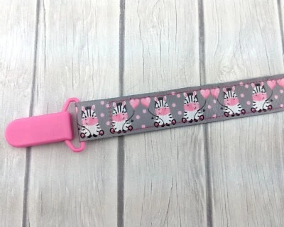 Soporte de clip para chupete cebra cinta para chupete regalo para bebé relleno de medias Foto 1 de 3
