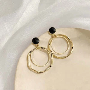 Clip on black and gold twisted double hoop earrings - Picture 1 of 2