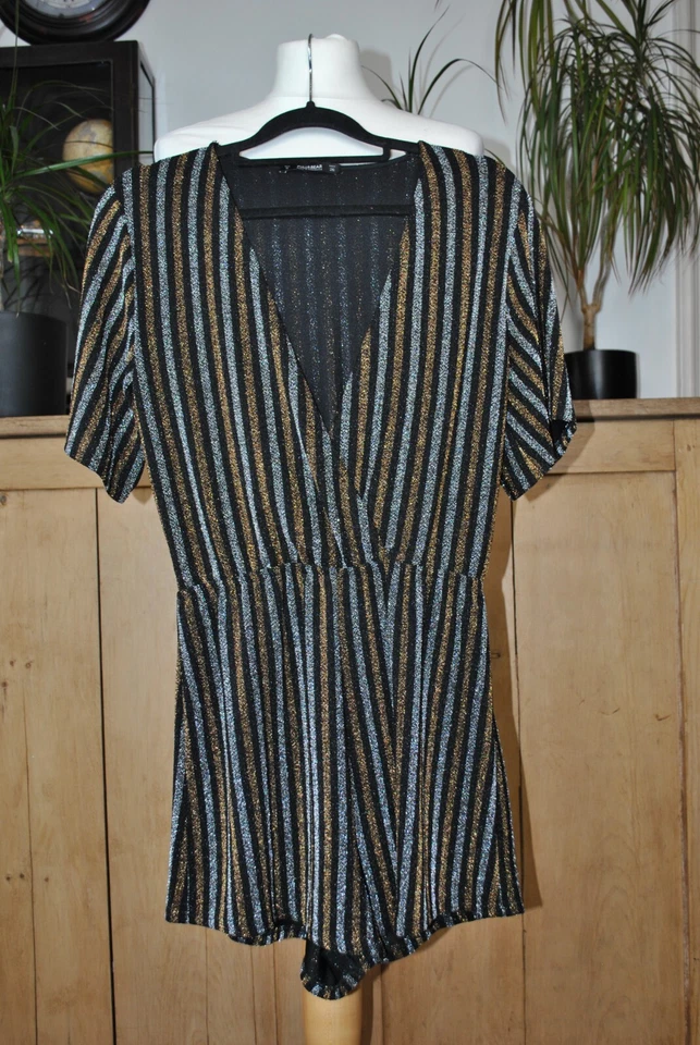 Mono Jersey Brillante Pull&Bear Negro, Plateado y Dorado Talla S Foto 1 de 4