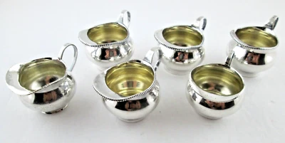 Juego de 6 jarras individuales de crema alemanas de plata .800 Foto 1 de 4