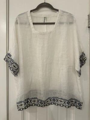 Top túnica bohemia bordada Monoreno blanco lino transparente talla pequeña manga ancha Foto 1 de 4