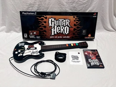Playstation 2 (PS2) Guitar Hero  Red Octane Wired Guitar In Box w/ Strap & Game - Image 1 of 4
