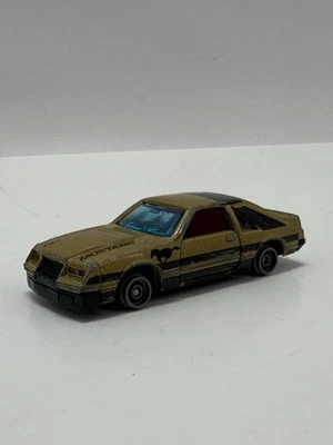 Coche de juguete fundido a presión vintage 1982 bloqueos dorado por Kidco Ford Mustang carrocería Fox Macao Foto 1 de 4