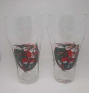 2 Coca Cola Glasses 1996 Vintage Holiday Santa Claus Train/Toys Christmas - Picture 1 of 3