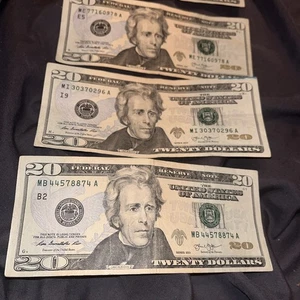 $20 bills Two  of them 2013 series and one  2017 A    miss cut at the bottoms - Picture 1 of 1