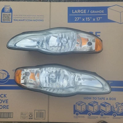 Juego de faros Chevrolet Monte Carlo 2000 a 2005 par - sin bombillas 01, 02, 03, 04, Foto 1 de 4