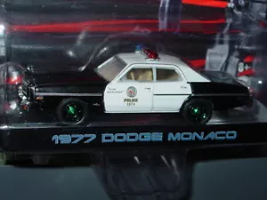GREENLIGHT 1977 DODGE MONACO TERMINATOR POLIZEI GRÜNE MASCHINE JAGD schwarz & weiß - Bild 1 von 3