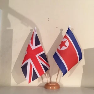 UNION JACK AND NORTH KOREA TWIN TABLE FLAG SET with WOODEN BASE 9"X6" FLAGS - Picture 1 of 1