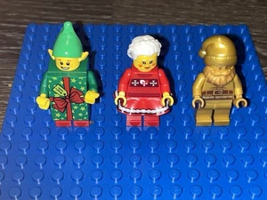 Authentisches Set mit 3 LEGO Weihnachten Minifiguren Gold Santa Frau Claus grüner Stein - Bild 1 von 7