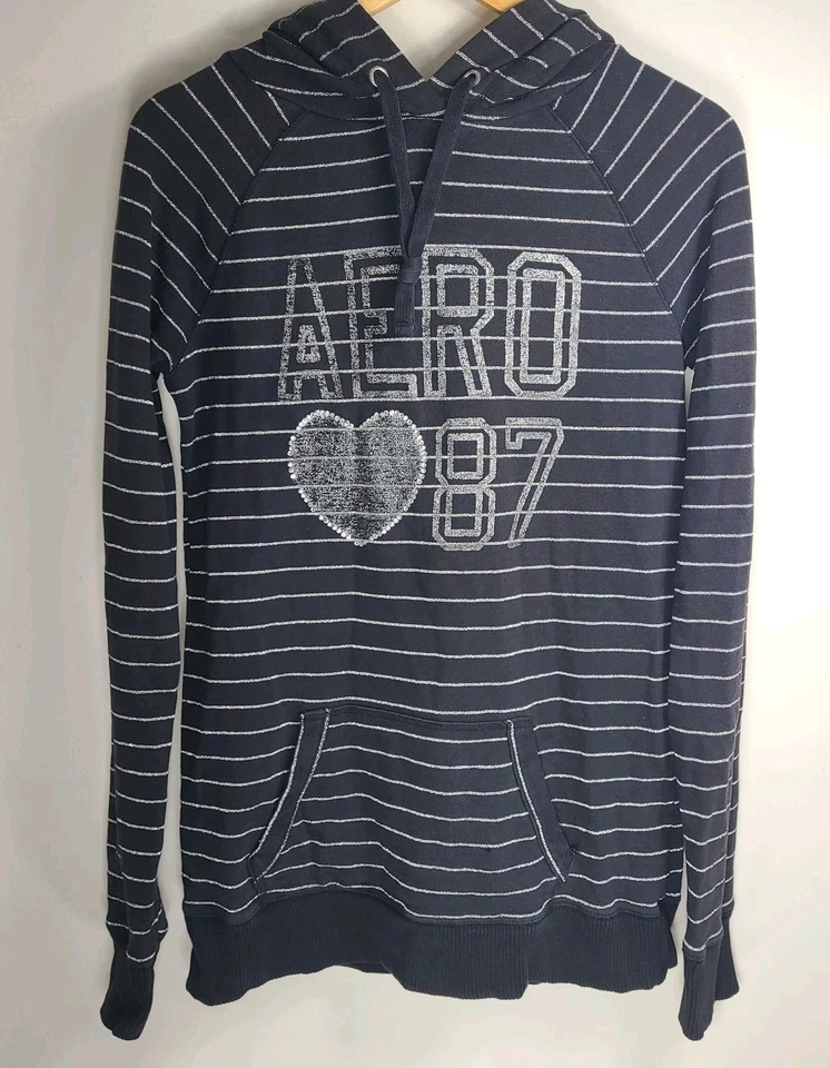 Sudadera con Capucha Aeropostale Para Mujer Mediana Espalda Rayas AERO 87 Corazón Logo Usada en Excelente Condición Foto 1 de 4