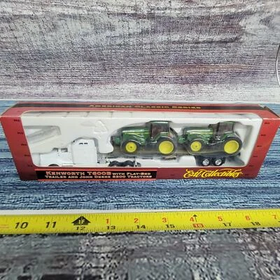 De colección 1997 1/87 Ertl Coleccionable KW T600B con plataforma TRL y 2 John Deere 8300's  Foto 1 de 4