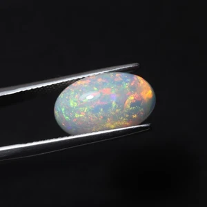 4.5 Cts 15.7x9.5 MM Real AAA Red Yellow Green Fire Ethiopian Opal Oval Cabochon - Picture 1 of 9