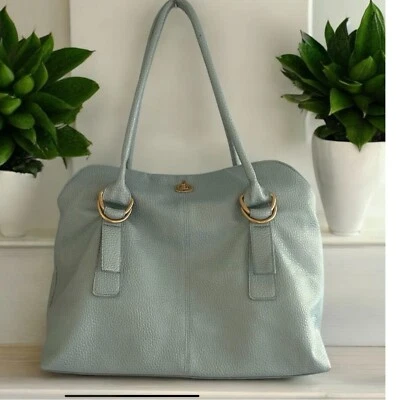 Bolso de hombro Bueno azul con detalles dorados Foto 1 de 4