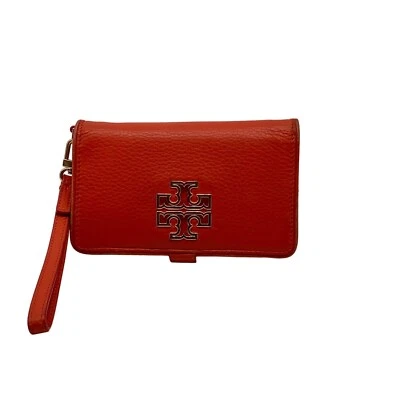 Muñequera Britten de cuero naranja Tory Burch para teléfono inteligente Foto 1 de 4
