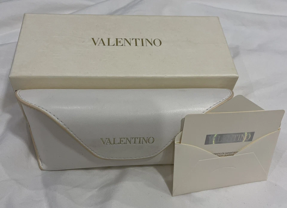 Gafas de sol Valentino ROCKSTUD con montura de metal amarillo Foto 1 de 4