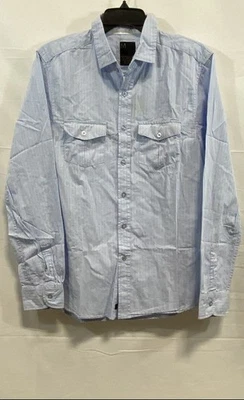 Camisa de algodón para hombre azul lisa con botones ajuste medio versátil Foto 1 de 4